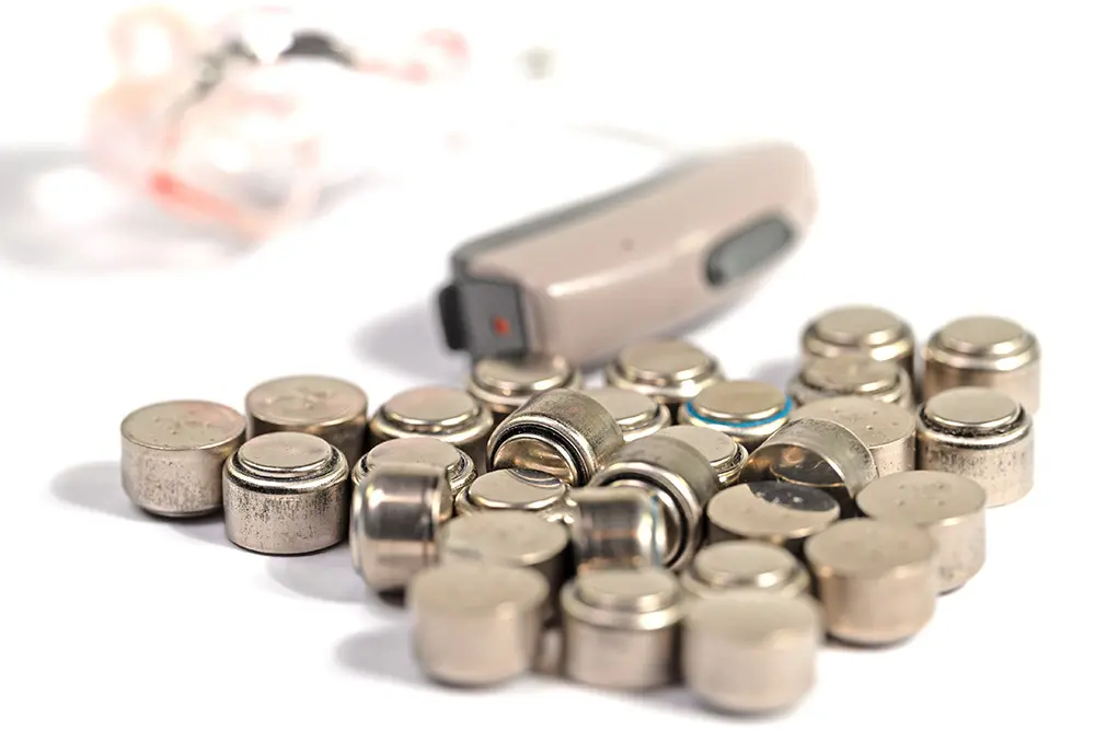 closeup of hearing aid batteries