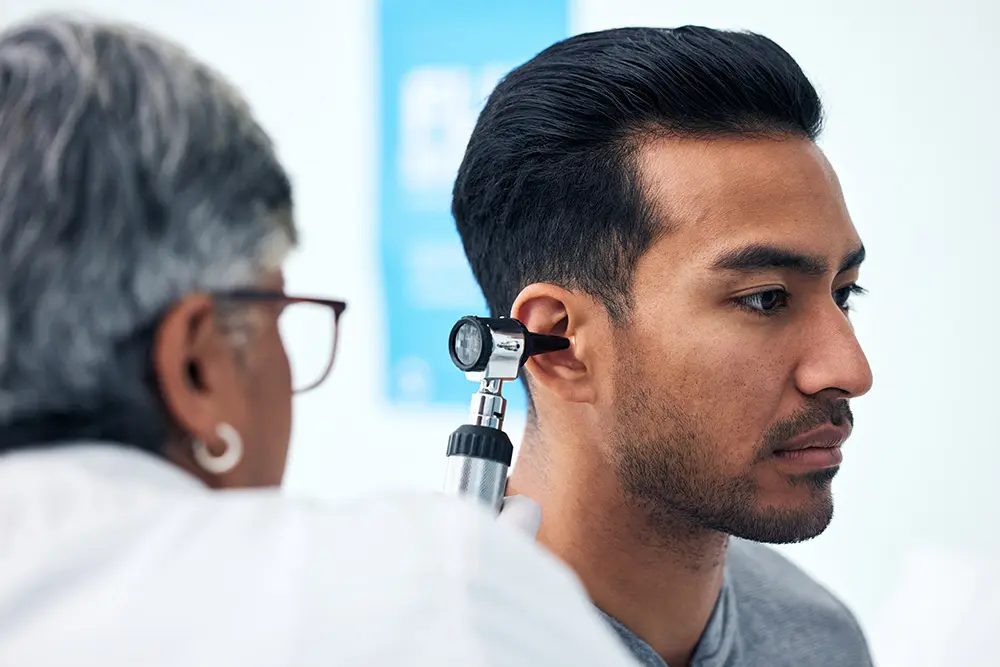 man doing a hearing test